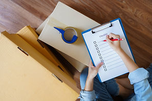 Checking packed boxes against a checklist